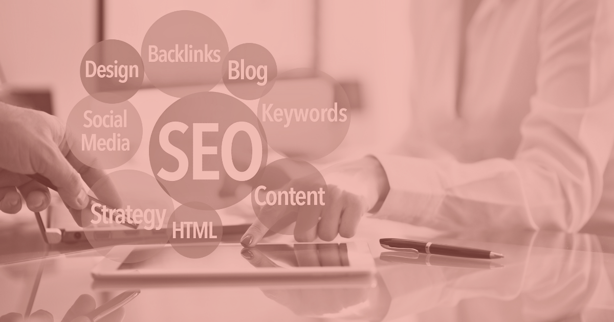 SEO concept image showing keywords like content, backlinks, and strategy on a digital tablet — representing search engine optimization.